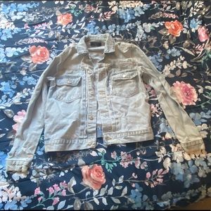 Distressed Jean Jacket.